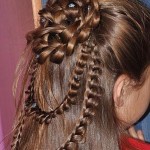 Как выглядят ажурные косы на длинные волосы